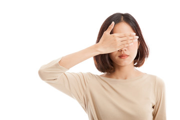 Young Asian business woman close her eyes with hand