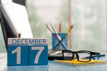 December 17th. Day 17 of month, calendar on Customer Services Assistant workplace background. Winter time. Empty space for text