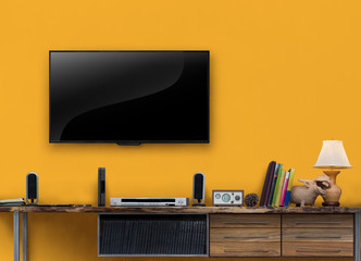 Led tv wooden table with yellow wall in livingroom