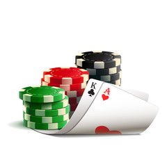 Casino chips and cards isolated on a white background.