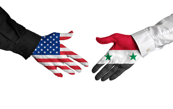 United States and Syria leaders shaking hands on a deal agreement