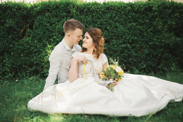 Beautiful, perfect couple posing on their wedding day