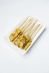 Grill pork satay on white texture background