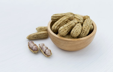 Steamed peanut in wooden bowl 