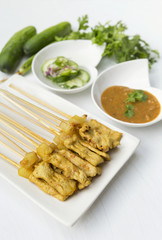 Thai style pork satay with peanut sauce and cucumber sauce