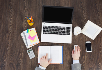 Obraz premium Office workplace with office supplies and laptop