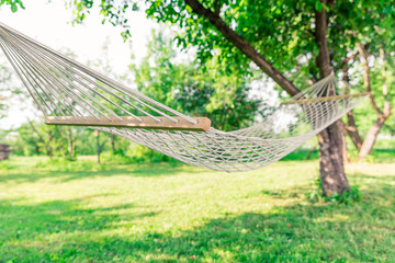 White hammock among the trees