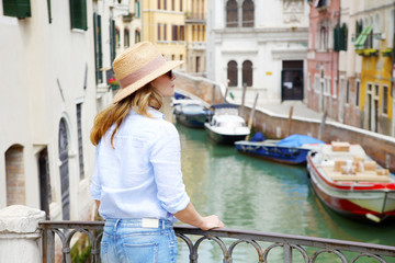 Fototapeta na wymiar Attractive mature woman enjoying her vacation in Venice
