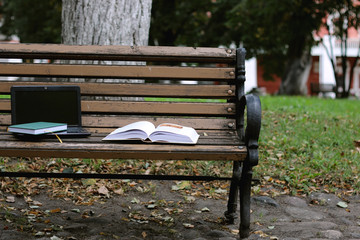 books on a bench in the school year