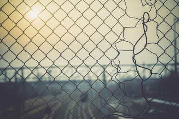 Mesh Fence with Sunrise