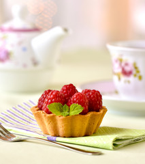 Fruit raspberry tart cakes on a table