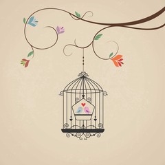Vintage cage with birds