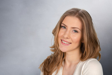 Fototapeta premium portrait of attractive caucasian smiling woman