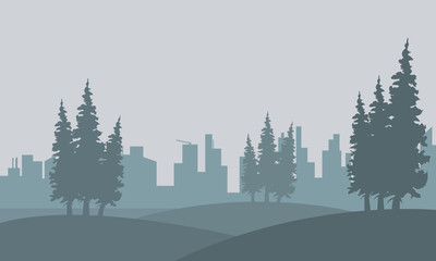 Silhouette of spruce and city in fog