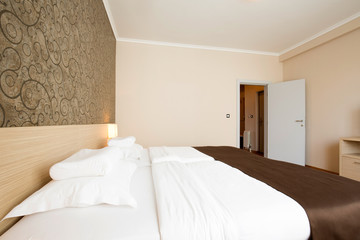 Modern elegant hotel bedroom interior