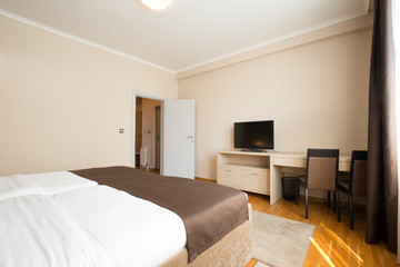 Modern elegant hotel bedroom interior