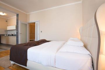 Modern elegant hotel bedroom interior