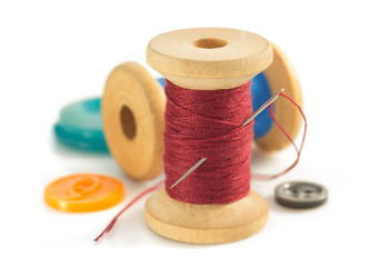 sewing tools and accessories on white