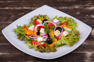 Fresh vegetable greek salad on the table