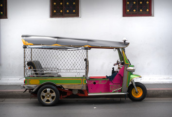 three wheels taxi name tuk tuk ,famous in bangkok thailand