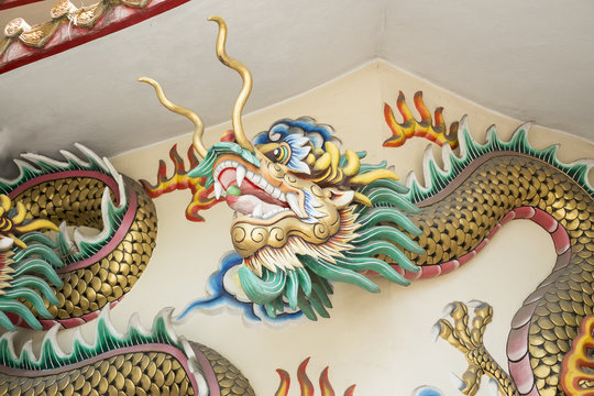 dragon statue at  temple wall 