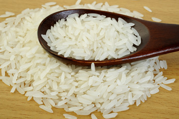 rice in wooden spoon
