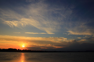 Fototapeta na wymiar 谷中湖から望む日の入り ( Sunset seen from Lake Yanaka ) / 渡良瀬遊水地の谷中湖から見た日の入りを撮影しました。