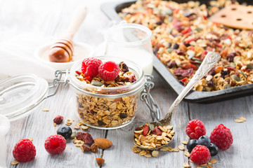 Homemade granola with fresh berries, selective focus