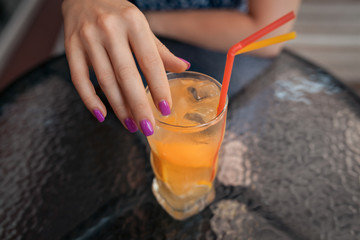 female has lunch with cold lemonade cocktail,