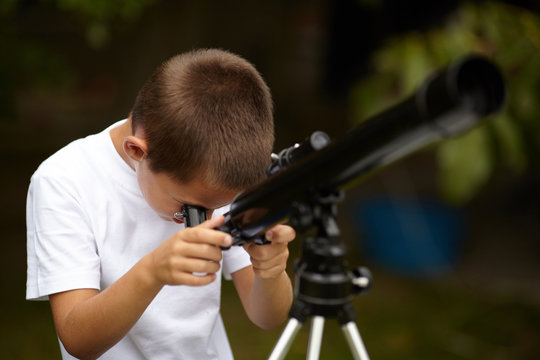 Happy Little Boy With Telescope