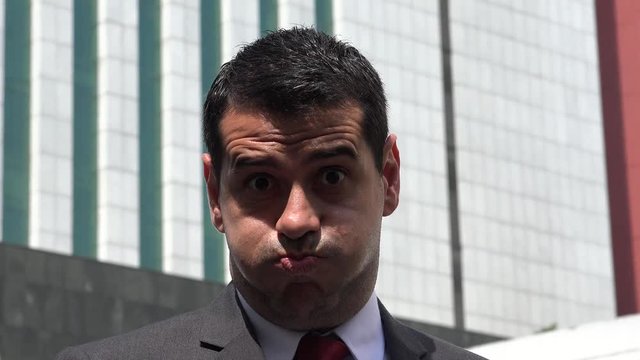 Business Man Making Funny Face