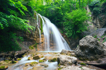 Dzhur- waterfall on the river Ulu-Uzen .
