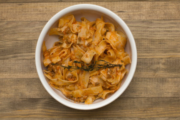 pasta  fettuccine bolognese in  dish