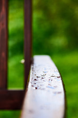 Drops of water on the wooden handle