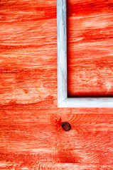 Old abstract picture frame on colored wooden background