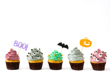 Halloween cupcakes isolated on white background
