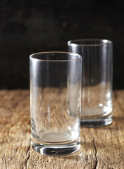 Empty glass in the wooden background
