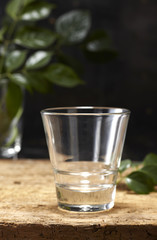 Empty glass in the wooden background
