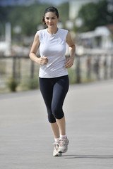 Running woman in the city