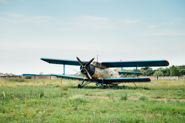 Airplanes standing on green grass. Ukraine, 2016