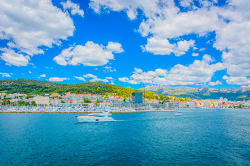 Naklejka na ściany i meble Split cityscape summertime. / Waterfront view at coastline of city Split and Marjan hill, summertime Croatia.