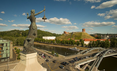 AERIAL. Statue on top of the Electricity building, Old town of Vilnius