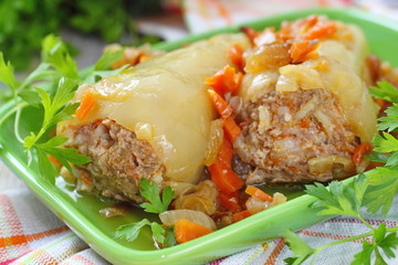Baked peppers stuffed with meat, rice and vegetable