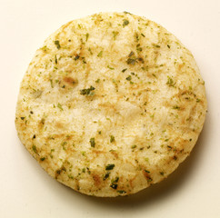 brownish Japanese rice biscuit with seaweed

