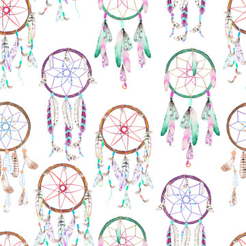Seamless pattern with dreamcatchers, hand drawn in watercolor on a white background