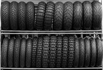 Motorcycle tires on rack store - 117179578