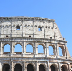 Obraz premium Great Colosseum in Rome, Italy, Europe. Roman Coliseum close-up with clear blue sky.