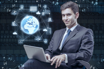 Young businessman in global computing concept