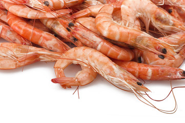 Group of fresh raw shrimp with lemon slice