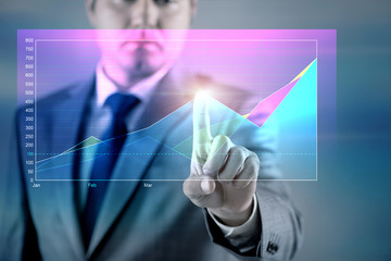 Businessman working with graph in business concept